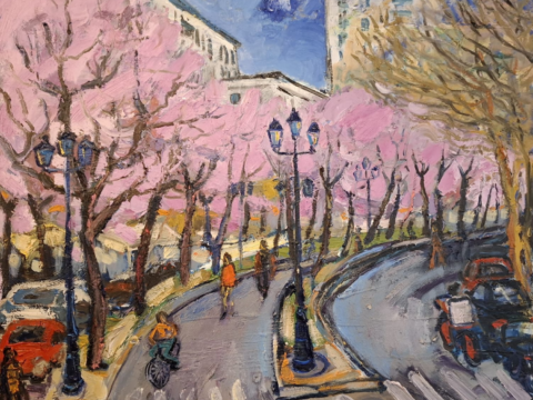A photograph of a painting of a street lined with trees.