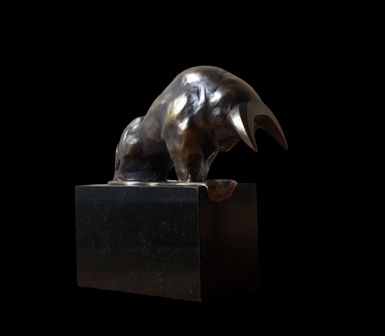 A photograph of a sculpture of a bull.