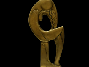 A photograph of a metal sculpture depicting an abstract human form.