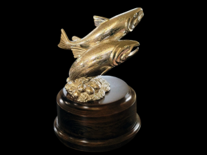 A photograph of a bronze sculpture of two fish.