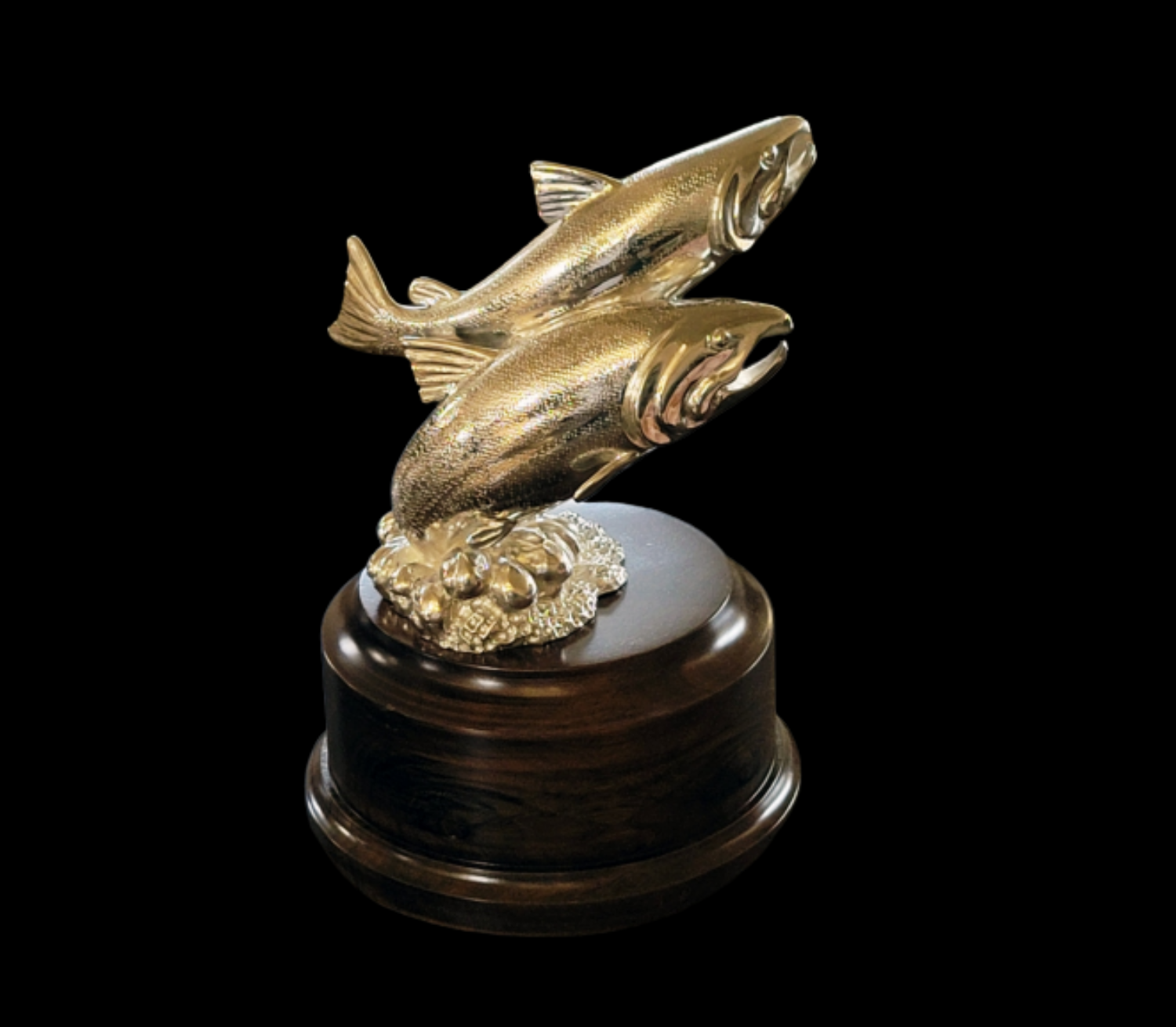 A photograph of a bronze sculpture of two fish.